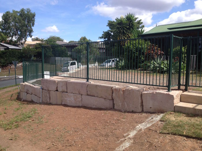 Grade B Sandstone Fence on Incline